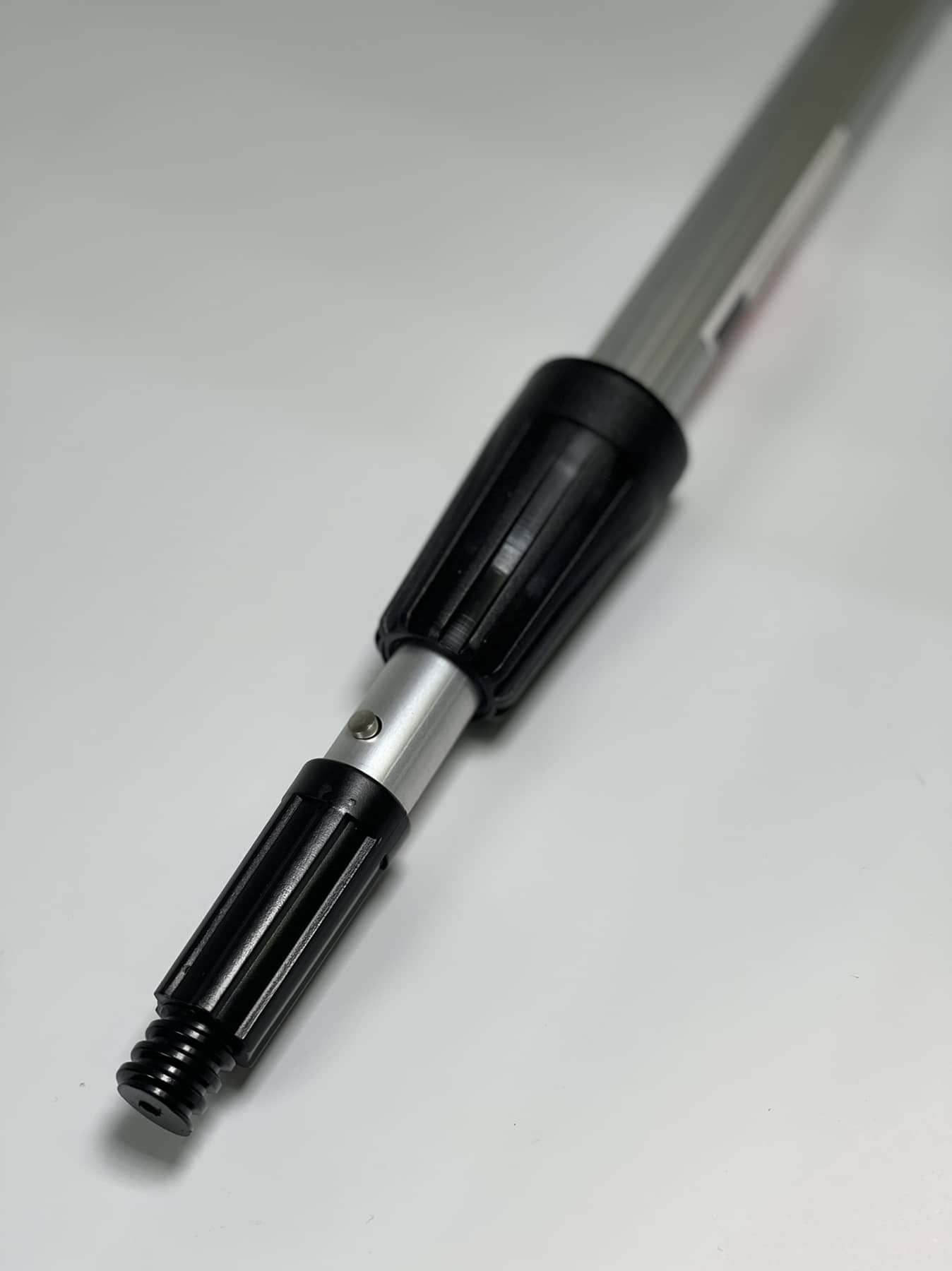 Universal tip for telescopic handle